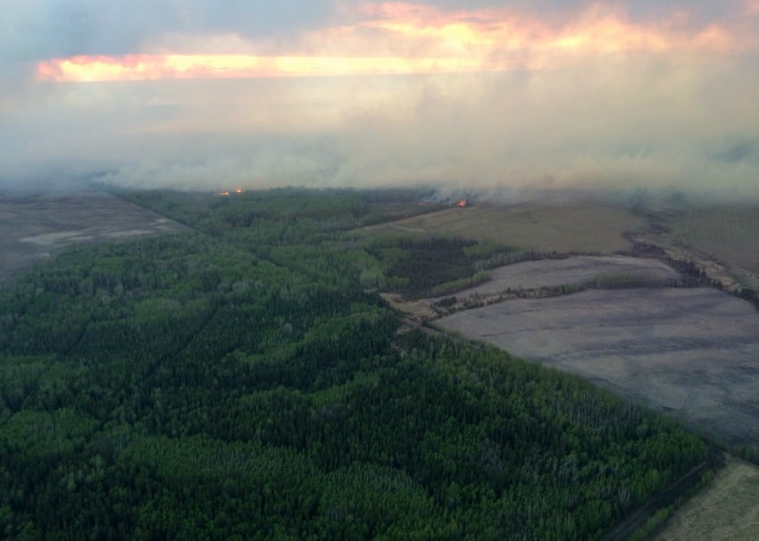 <who> Photo Credit: BC Wildfire Service. </who> Beatton Airport Road fire. 