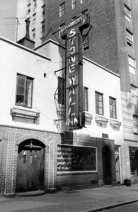 <who> Photo Credit: New York Public Library </who> The Stonewall Inn, September 1969. The sign in the window reads: "We homosexuals plead with our people to please help maintain peaceful and quiet conduct on the streets of the Village." 