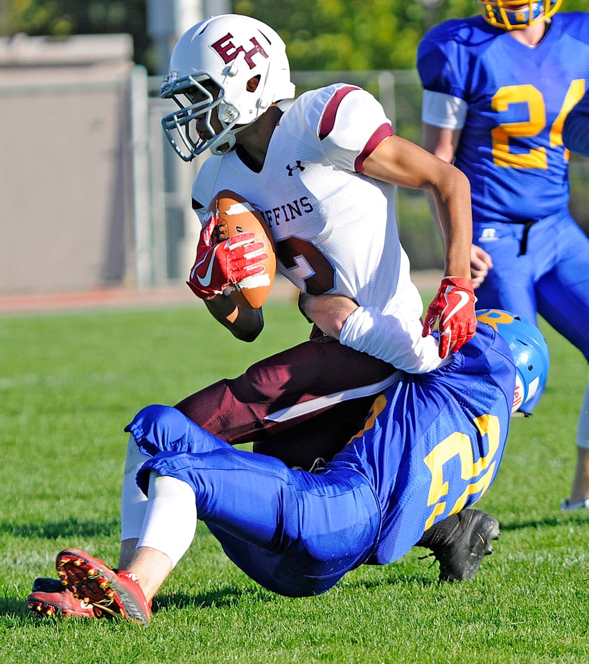 Austin Yuros makes one of his four solo tackles for the Voodoos at the Apple Bowl.