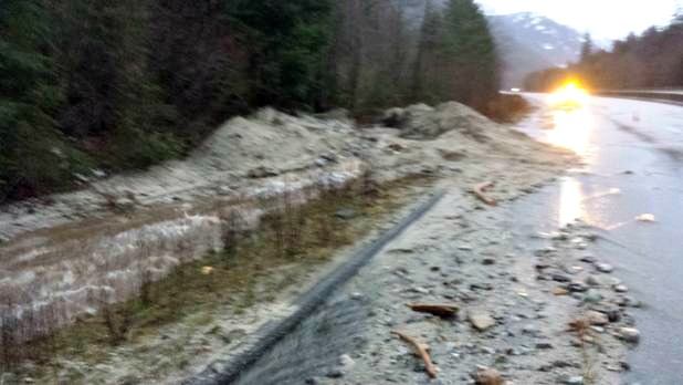 <who> Photo Credit: TransBC </who> The rockslide along Highway 5 causing lane delays.