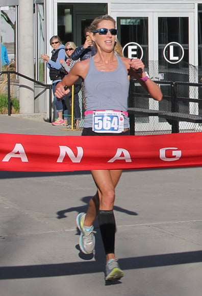 <who>Photo Credit: Kelsey Davis/KelownaNow.com </who>Christy Lovig tied her record set last year in the OC 10K event.