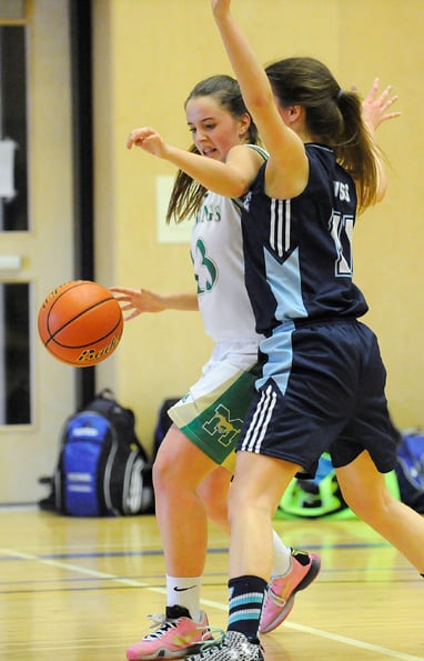 <who>Photo Credit: Lorne White/KelownaNow </who>Immaculata's Gabby Cocar finds little room to manoeuvre <br>against the Westsyde Whundas in their opening game at the <br>Okanagan Valley championship tournament.