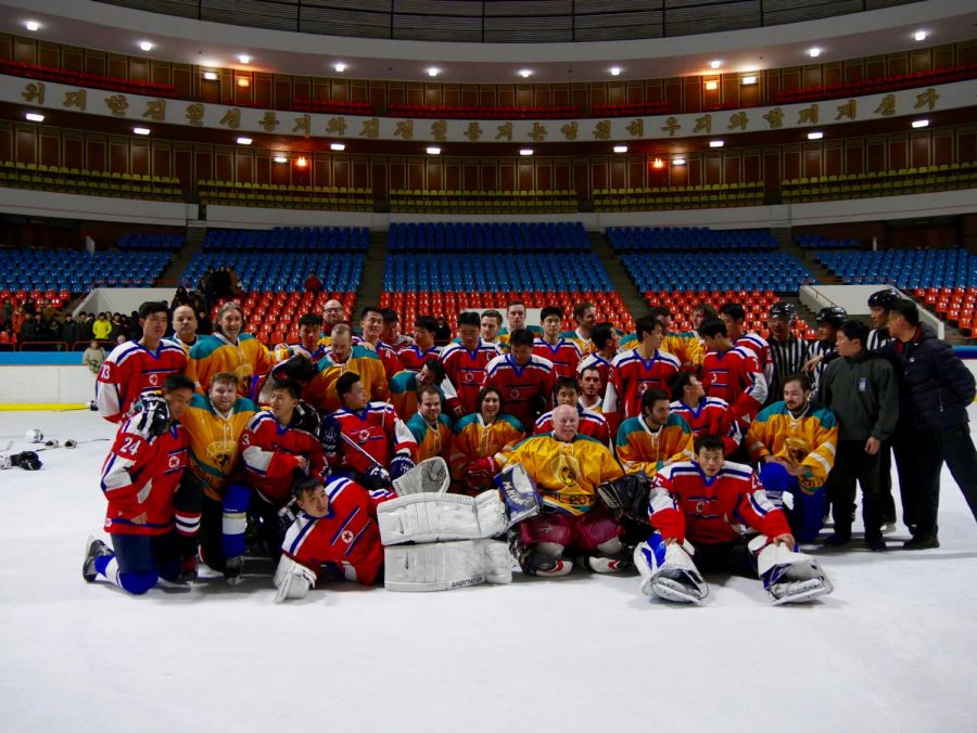<who> Contributed by Morgan Parker </who> The North Korean team in red and the HIFL team in yellow