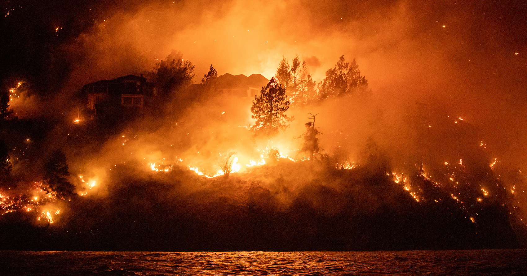 PHOTOS: Horrific destruction in Traders Cove as seen from Okanagan Lake
