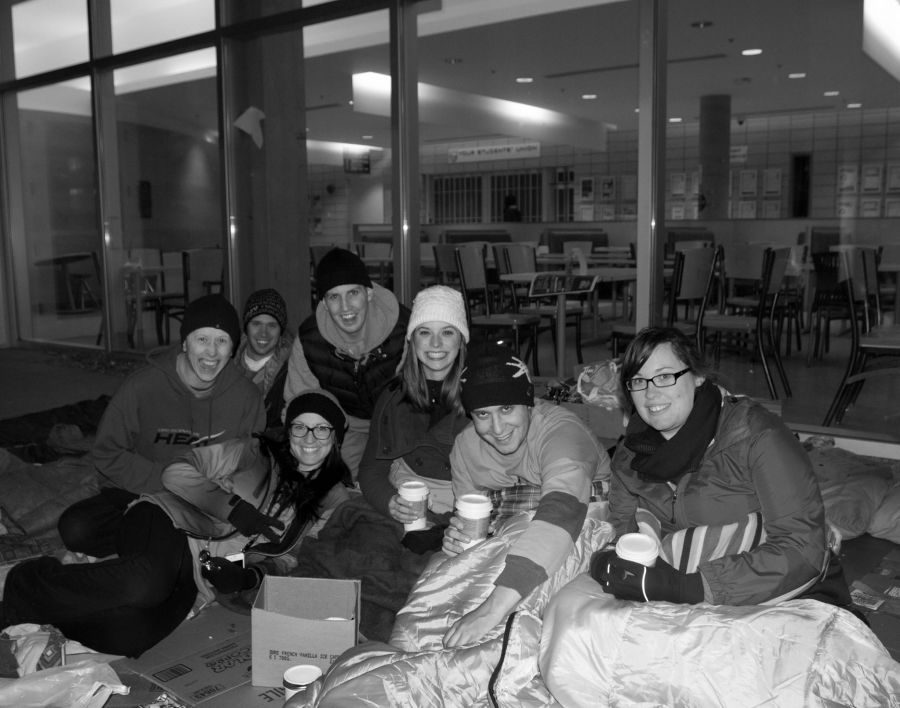<who>Photo Credit: 5 Days For The Homeless Facebook</who> Students sleeping outside in 2014