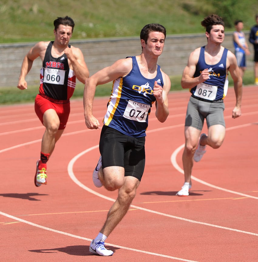 <who>Photo Credit: Lorne White/KelownaNow </who>Alex Gross, centre, of the OKM Huskies raced to first in both the senior 100- and 200-metre sprints.