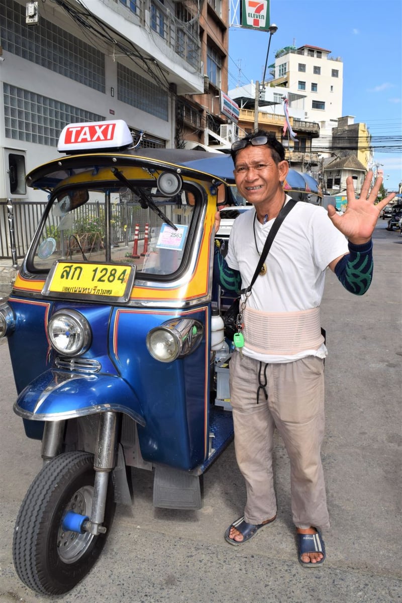 </who>Mr. Bund toured us around Bangkok in his tuk-tuk.