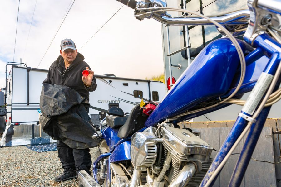 <who>Photo Credit: NowMedia/Gord Goble</who> Kevin Dugas with his bike and its dislodged tail cap