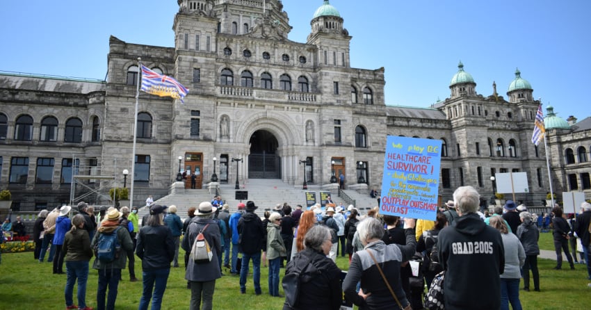 Demonstrators demand changes to healthcare system during rally on lawn of BC Legislature building