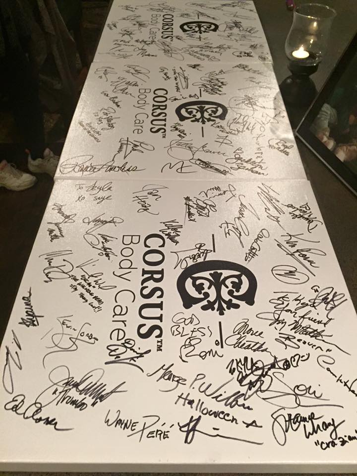 <who> Photo Credit: Kyla's Quest </who> Celebrities signed canvas boards in support of Kyla.