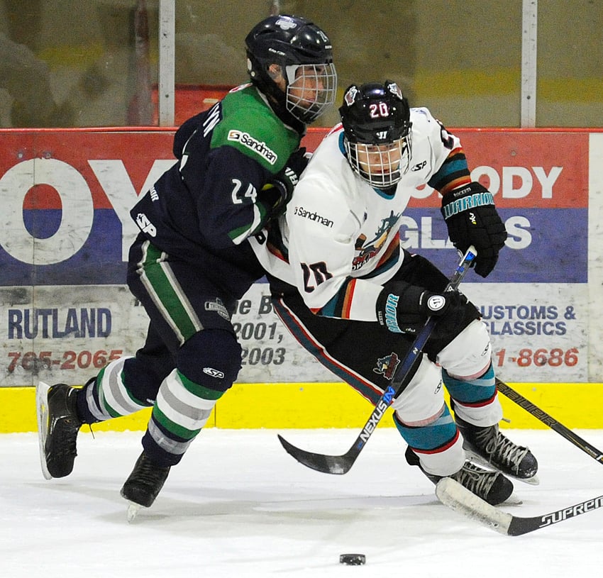 <who>Photo Credit: Lorne White/KelownaNow </who>Mitchell Gove, right, of the OK Rockets penetrates the Fraser Valley zone during a 5-3 loss on Sunday.