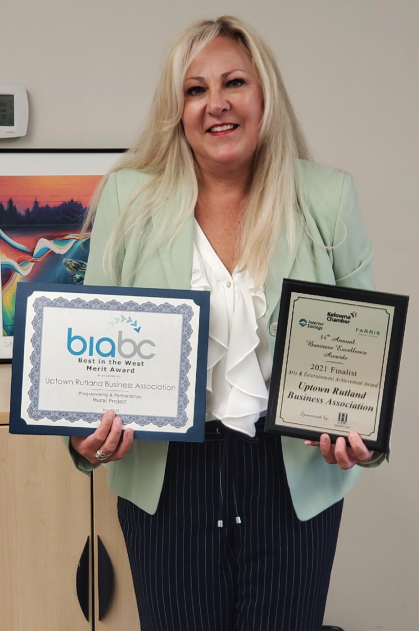 <who>Photo credit: URBA</who> Business Improvement Association of BC Merit Award and Kelowna Chamber of Commerce Finalist plaque, both for Uptown Mural Project.
