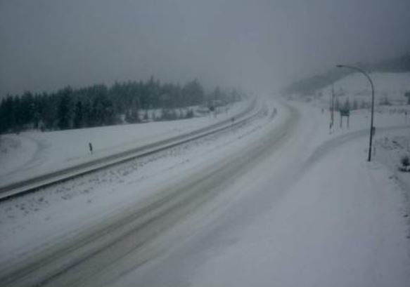 <who> DriveBC </who> HWY 5 (Coquihalla), Comstock Road, about 15 km south of Merritt, looking north.