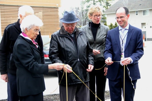 The Persons (left) did the honour of cutting the official ribbon for the new site of the artwork.
