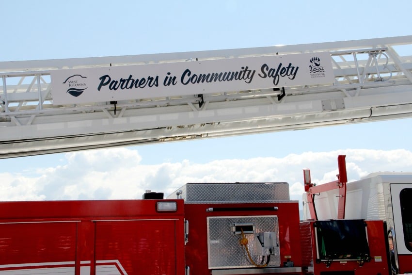 <who> Photo Credit: KelownaNow. </who> A fire truck, new to the service, has been painted to represent the partnership. 