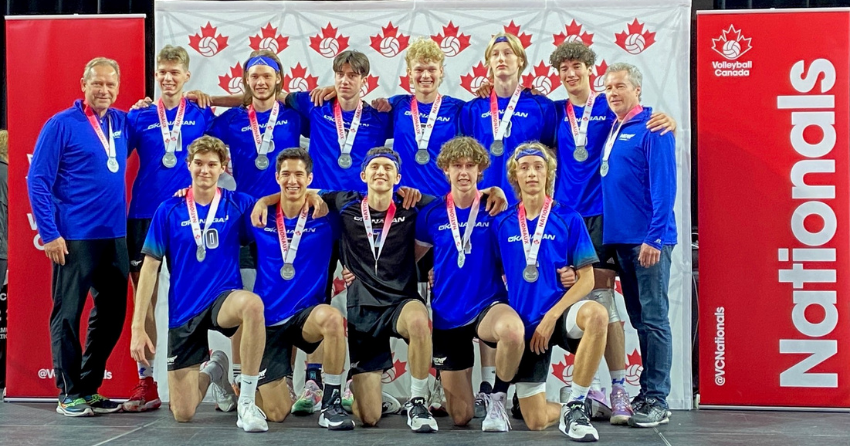 <who> Photo Credit: Contributed </who> The team poses with their silver medal. 