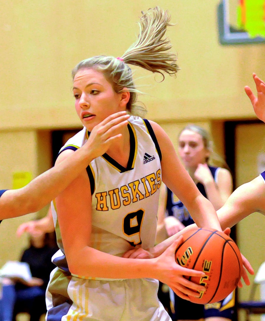<who>Photo Credit: Lorne White/KelownaNow </who>A double-double (16 points, 16 rebounds) by Lily Pink helped Huskies over Tweedsmuir.