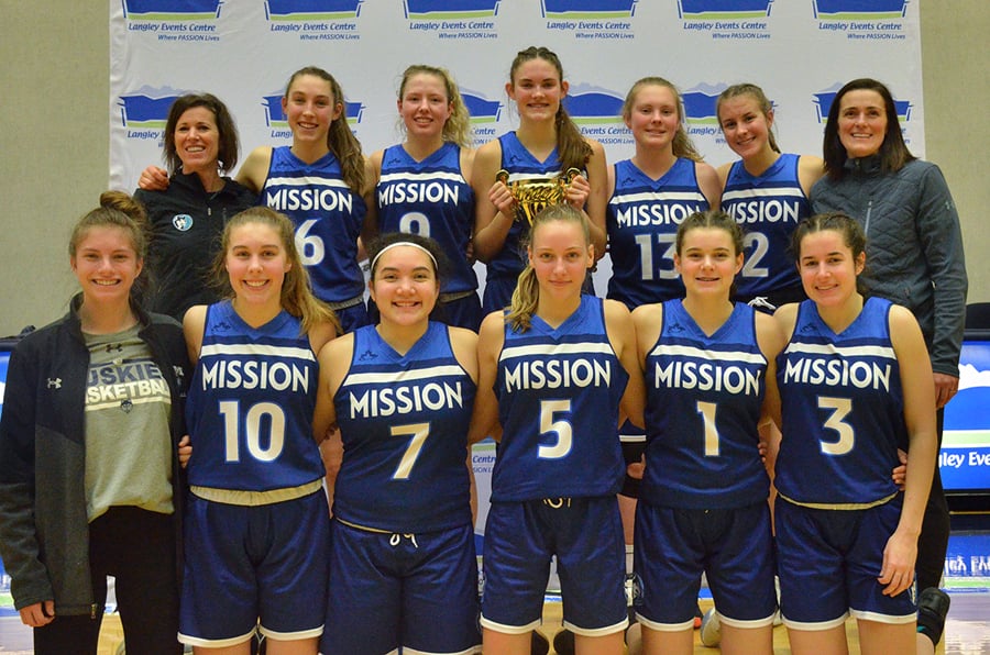 The Okanagan Mission Huskies won four straight games to capture the 2019 senior girls Tsumura Basketball Invitational championship at the Langley Events Centre. Members of the team are, from left, front; Jordyn Elliot, Devon Felt, Shae Faitala, Tatum Wade, Elana Corrado, and Melaina Corrado. Back: Jill Robinson (assistant coach), Stella LaGrange, Lily Pink, Makenna Jacklin, Celeste Roosdahl, Jordan Bury and Meghan Faust (head coach).