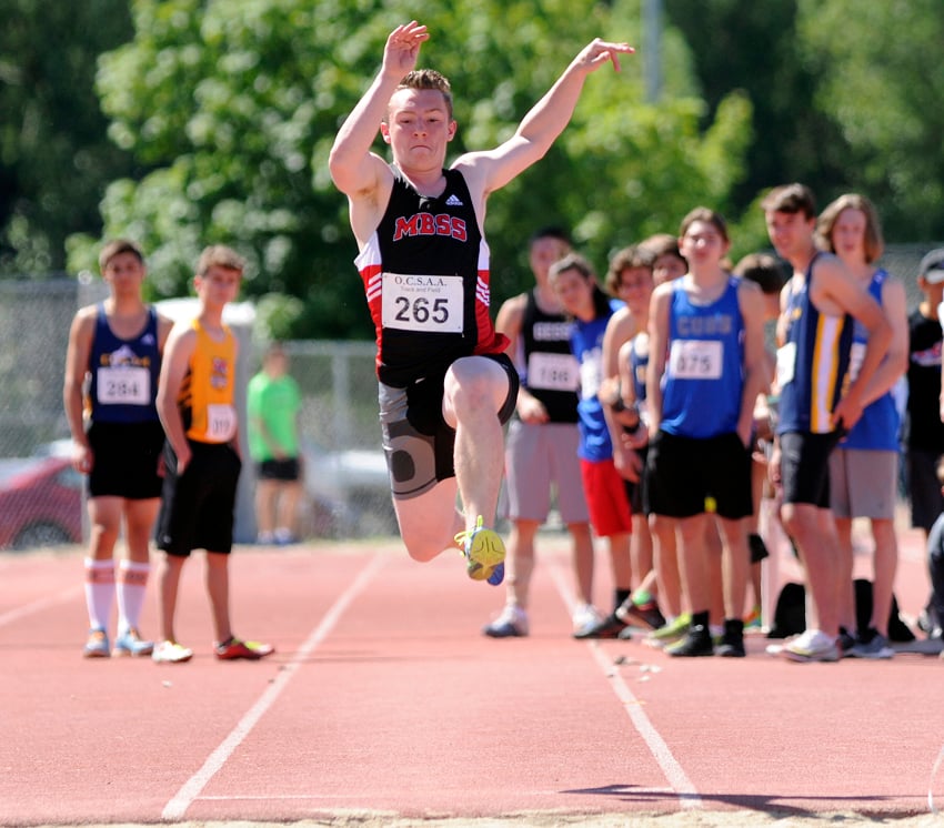 <who>Photo Credit: Lorne White/KelownaNow </who>Mt. Boucherie's Gavin Cloutier on his way to a long-jump distance of 4.90 metres.