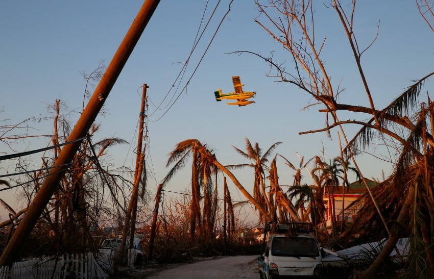 <who>Photo credit: Getty Images/Jose Jimenez</who> A relief plane departs on September 6, 2019 in Elbow Key Island, Bahamas. 