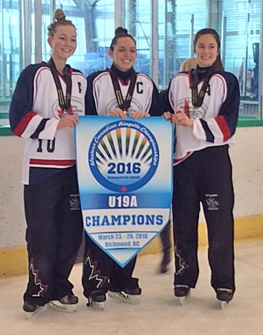 <who>Contributed </who>Kelowna Heat captains with the Western Canada banner, from<br> left: Stephanie Russo, Morgan Evans and Taylor Pilon.