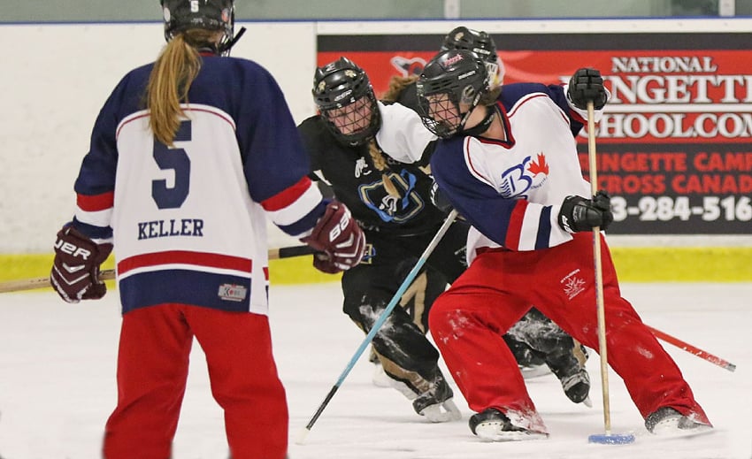 <who>Photo Credit: Xgenphoto.com </who>TORL Force's Alyssa Racine of Vernon makes a power move toward the net against Gloucester-Cumberland, Ont. at the national U16 ringette championship in London, Ont.
