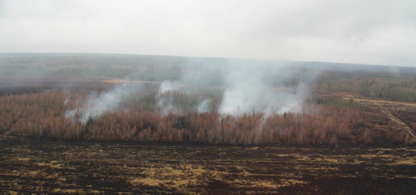 The Beaton Airport Road fire got going again after hot weather and wind on Saturday.