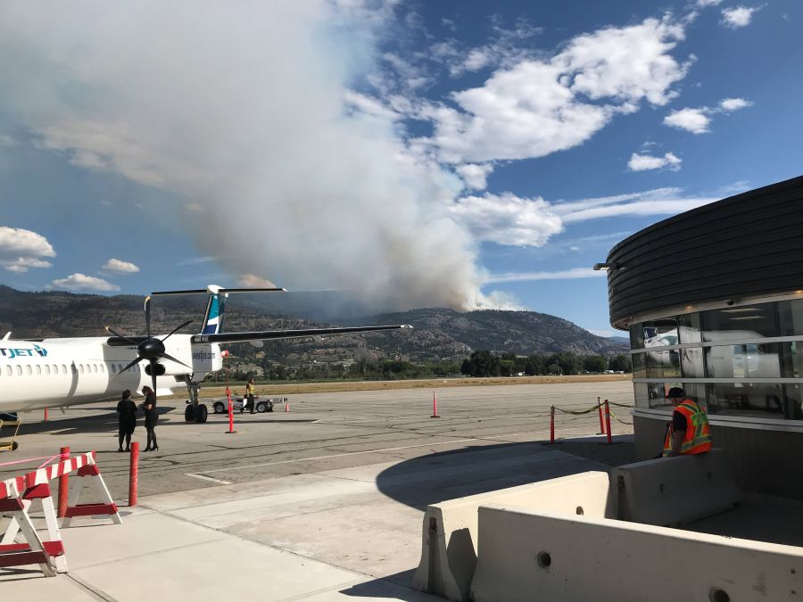 <who>Photo Credit: Trisha White</who> On duty at the airport, Trisha White snapped this early fire photo