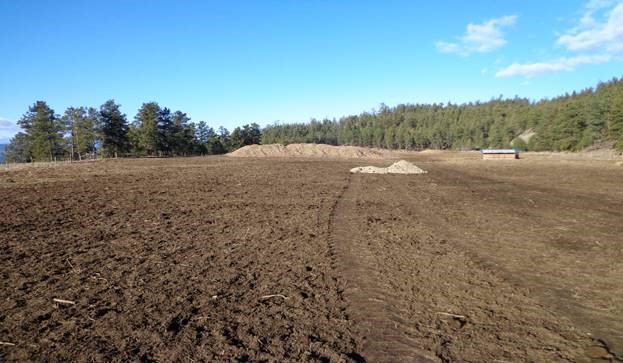 <who>Photo Credit: RDOS</who> Photo of proposed composting facility land