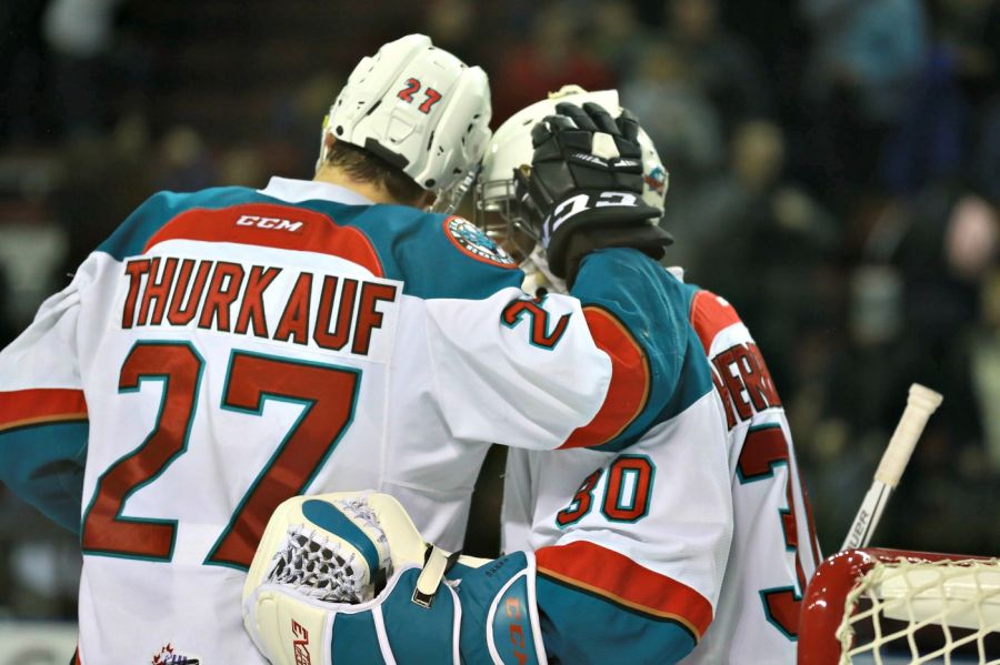 <who>Photo Credit: KelownaNow</who>Calvin Thurkauf scored the empty netter to ice the game and then celebrated with Michael Herringer.
