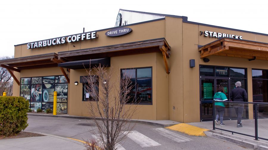 <who>Photo Credit: NowMedia</who> Coffee-deprived customers walk away from the Riverside Starbucks Sunday afternoon