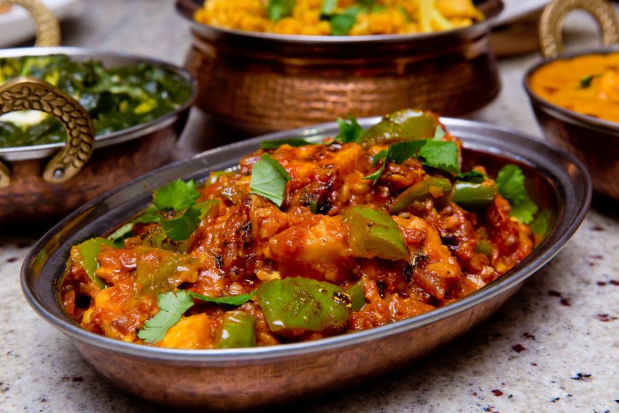 Chili Paneer (bell pepper and paneer cooked with onions and Indian spices).