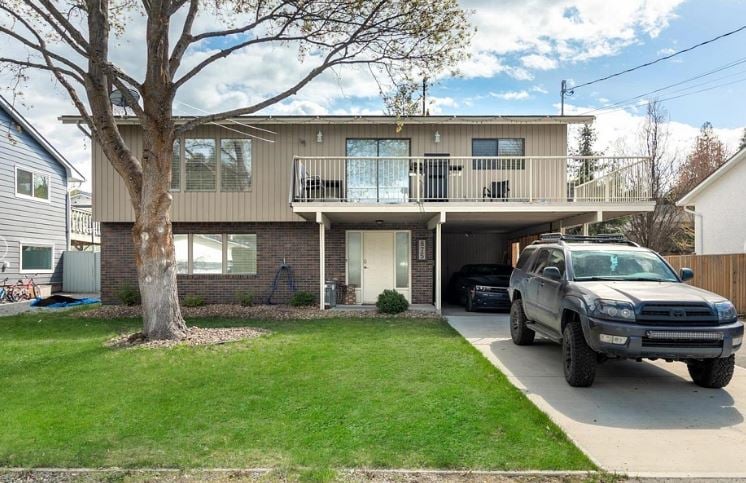</who>This four-bedroom, two-bathroom, 2,000-square-foot house on Hammer Avenue in the Lower Mission is listed for sale for $999,999, which is a little less than the benchmark selling price of $1,017,500 for a typical single-family home in Kelowna in August.