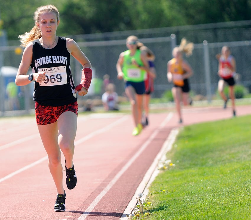 <who>Photo Credit: Lorne White/KelownaNow </who>Taryn O'Neill of the George Elliot Coyotes ran to a comfortable first-place finish in both the 1,500-metre and 3,000-metre races.