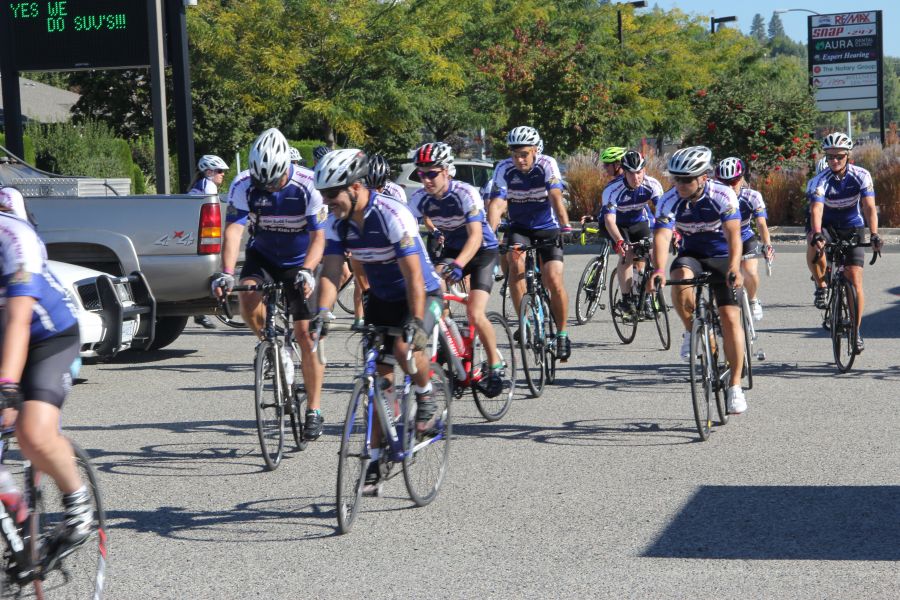 <who>Photo Credit: KelownaNow</who> Riders take on 10 day journey at the Cops for Kids Ride in September 2015.