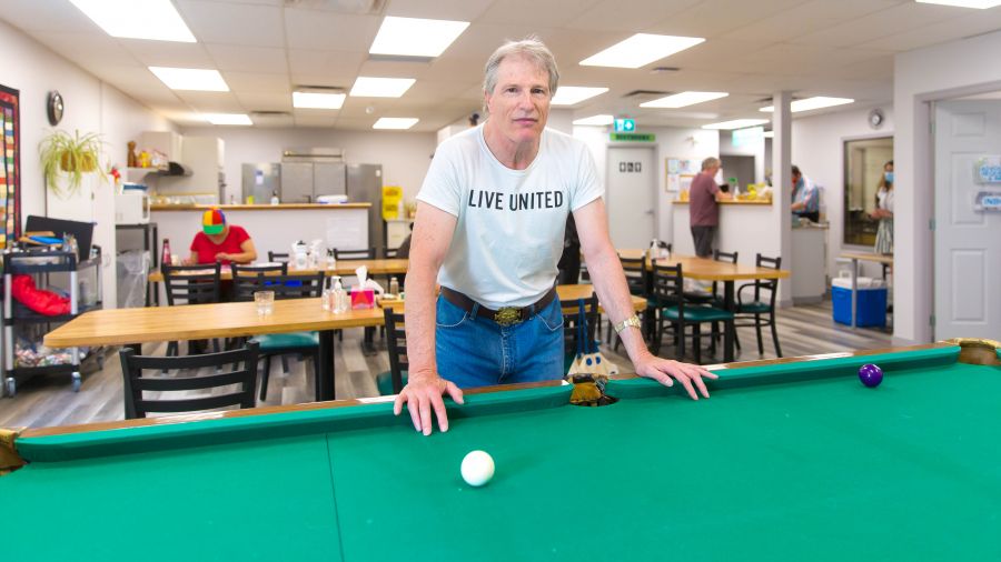 <who>Photo Credit: NowMedia</who> Brent, at the pool table