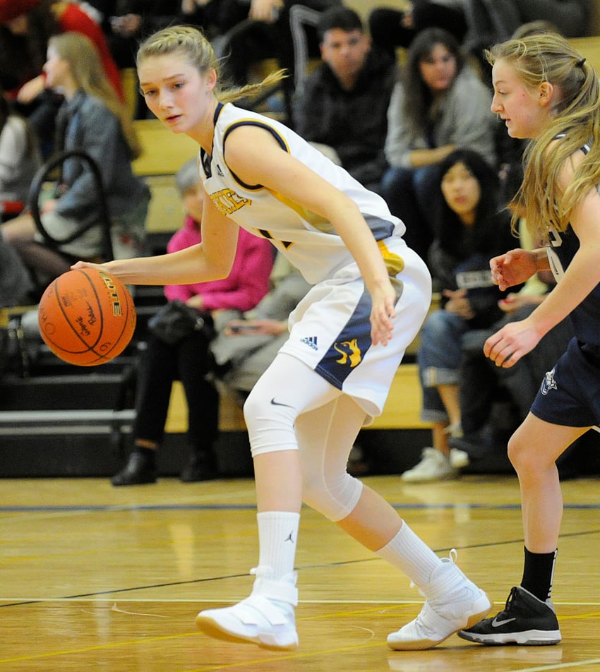 <who>Photo Credit: Lorne White/KelownaNow </who>Hannah Walline's 24 points led the OKM Huskies to their win over the Sahali Sabres of Kamloops.
