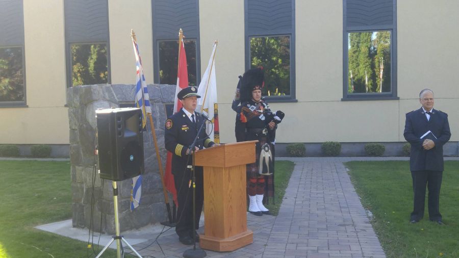 <who>Photo Credit: NowMedia </who>Penticton Fire Department Chief Larry Watkinson was joined by Major Tim Leslie from the Penticton Salvation Army and a local piper for the special 9/11 Memorial Service held Tuesday morning.