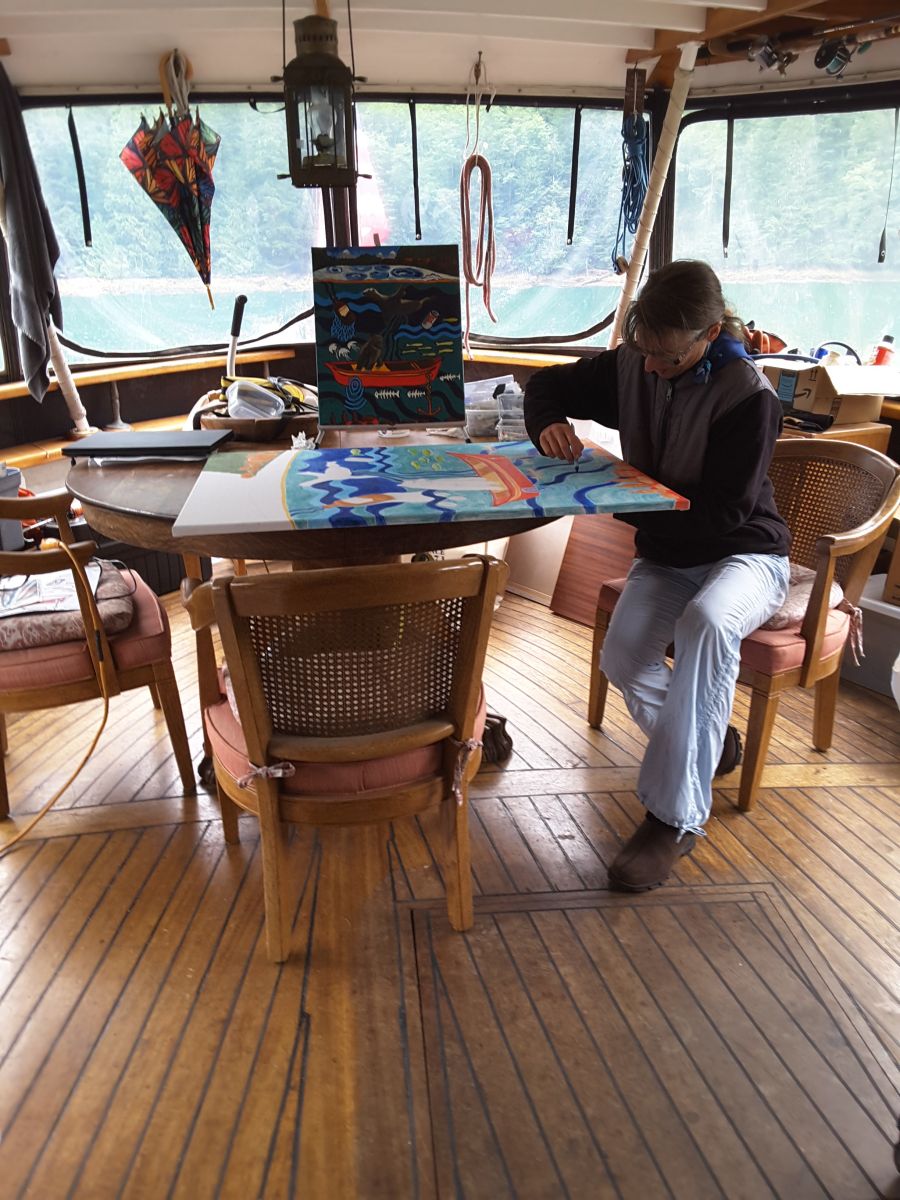 <who>Photo Credit: Gabriele Beyer</who> Gabriele Beyer painting aboard the M/V Orina