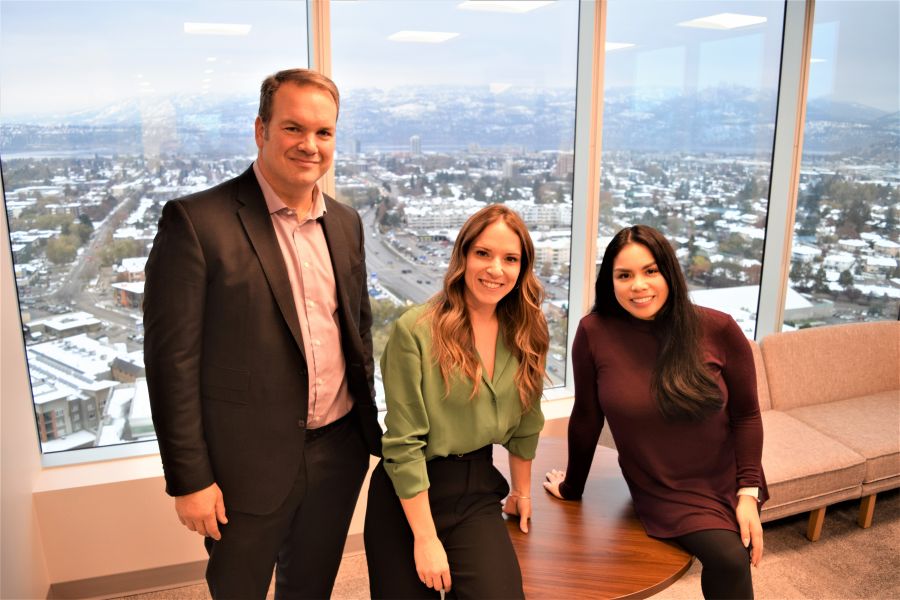 </who>Wealth advisor Mark Mariotto, left, associate Emmy Pachenski and associate vice-president for Western Canada Jennifer Hochstein in the northwest corner office of Wellington-Altus Private Wealth on the 23rd floor of Landmark 7. Don't know if you can see the downtown skyline and Okanagan Lake view in the background?