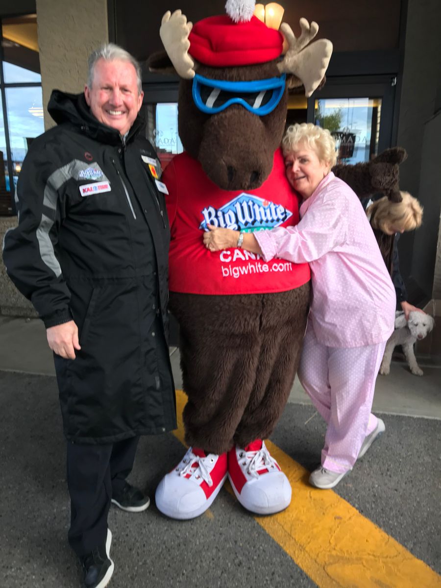 <who>Photo Credit: Contributed</who>Maxine DeHart with Michael J. Ballingal and the Big White mascot.