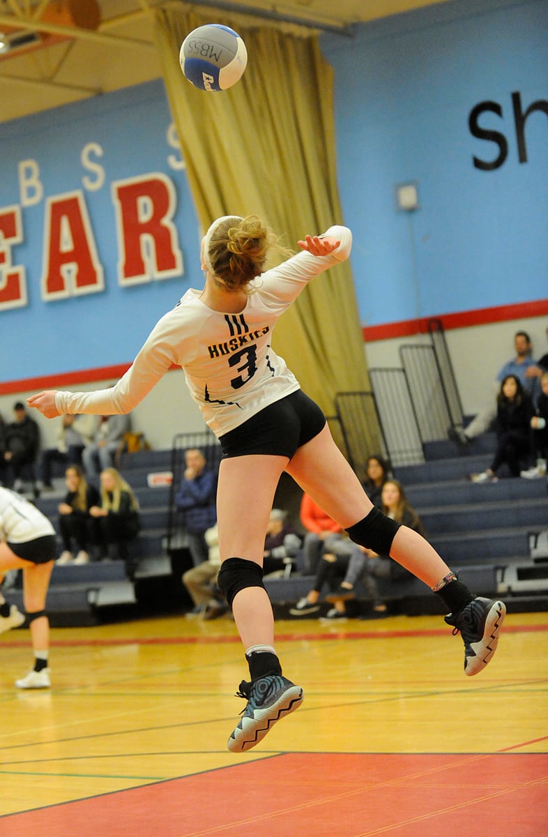 <who>Photo Credit: Lorne White/KelownaNow </who>Rosie Howard of the OKM Huskies serving a laser against the KSS Owls in the Valley final.