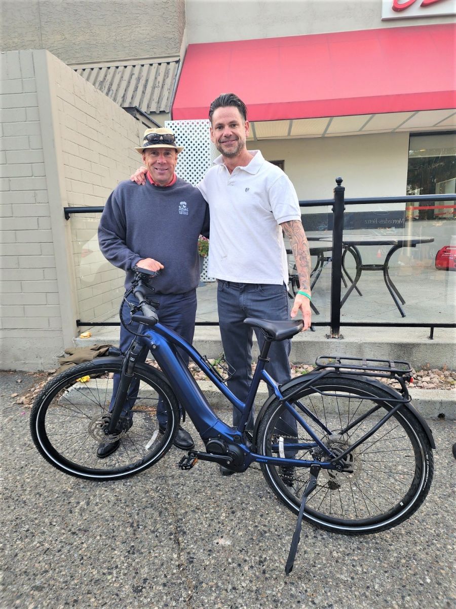 </who>Kelowna city council candidate Ron Cannan, left, got his stolen e-bike back with help from former cop and fellow city council candidate Chris Williams.