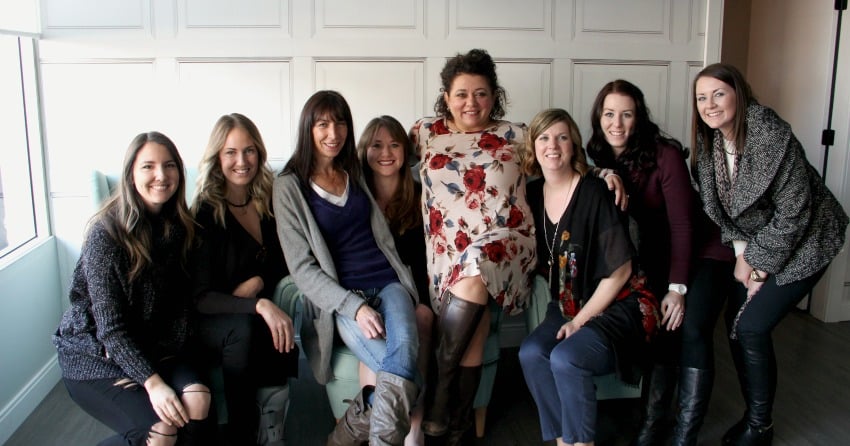 The members of Mamas for Mamas and Sticks and Stones Design Group celebrate the grand opening of the new Mamas for Mamas location.