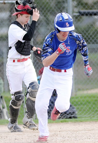 <who>Photo Credit: Lorne White/KelownaNow </who>Noah Ringness-Law tripled and collected four hits in the opener.