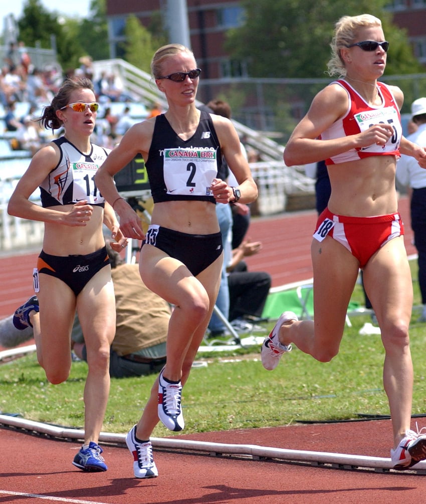 <who>Photo Credit: Lorne White/KelownaNow </who>Malindi Elmore was third coming around the final turn but overtook both Carmen Douma-Hussar, centre, and Kate Vermeulen, but overtook them on the home stretch. "The race felt effortless and I felt like I could still have run much faster," said Elmore. "It is sort of sad to think that I actually never ran any faster than that day again (I came close several times) -— sometimes we don’t learn how special something is until hindsight. I remember coming around for the final lap and Carmen Douma-Hussar starting to pull away from me, but on the final stretch, with 100 metres to go, I felt this surge of power and energy and was just able to power home. Crossing the line, with a championship record, my first Canadian title, and a spot on the Olympic team was an unbelievable feeling and definitely one of the top moments in my life." 