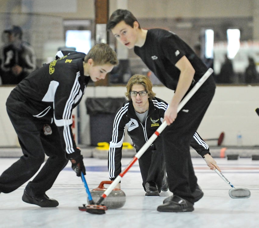<who>File photo Credit: Lorne White/KelownaNow </who>Logan Miron, centre, is the first KSS skip since Glen Campbell in 1989 to win a provincial high school curling title.