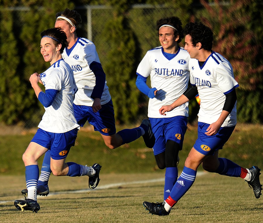 Zack MacInnes celebrates the game's first goal with Rutland teammates Carson Martin, Bernardo Rosenthal and Dylan Robles.