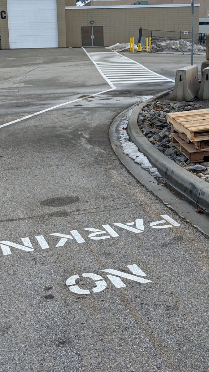 <who>Photo Credit: NowMedia/Gord Goble</who> This interim "painted walkway" exists in place of a $600,000 enclosed PTCC walkway