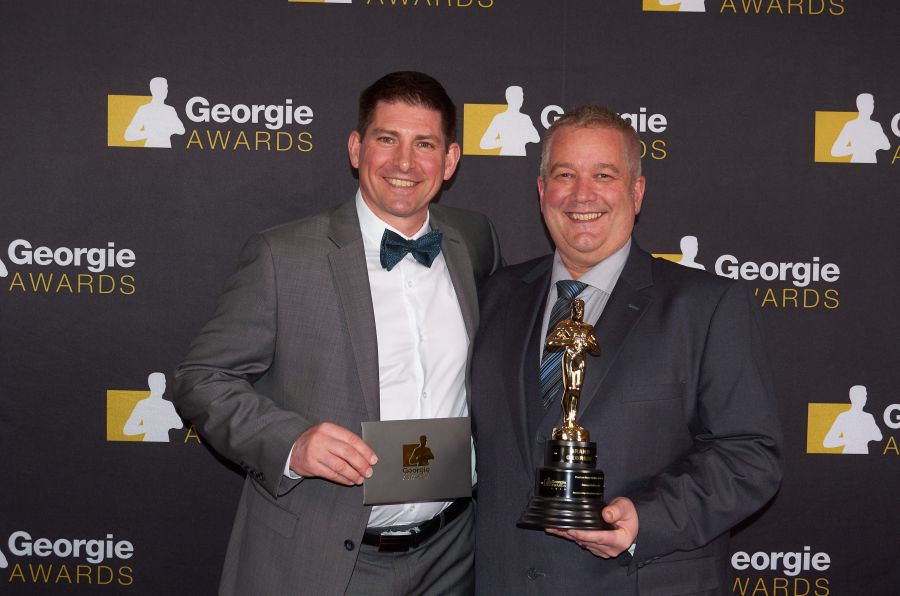 <who>Photo Credit: Contributed</who>Bruce Young, Construction Manager (left) & Darren Witt, President of Bercum Builders (right) accepting Georgie Award for Custom Home Builder of the Year.